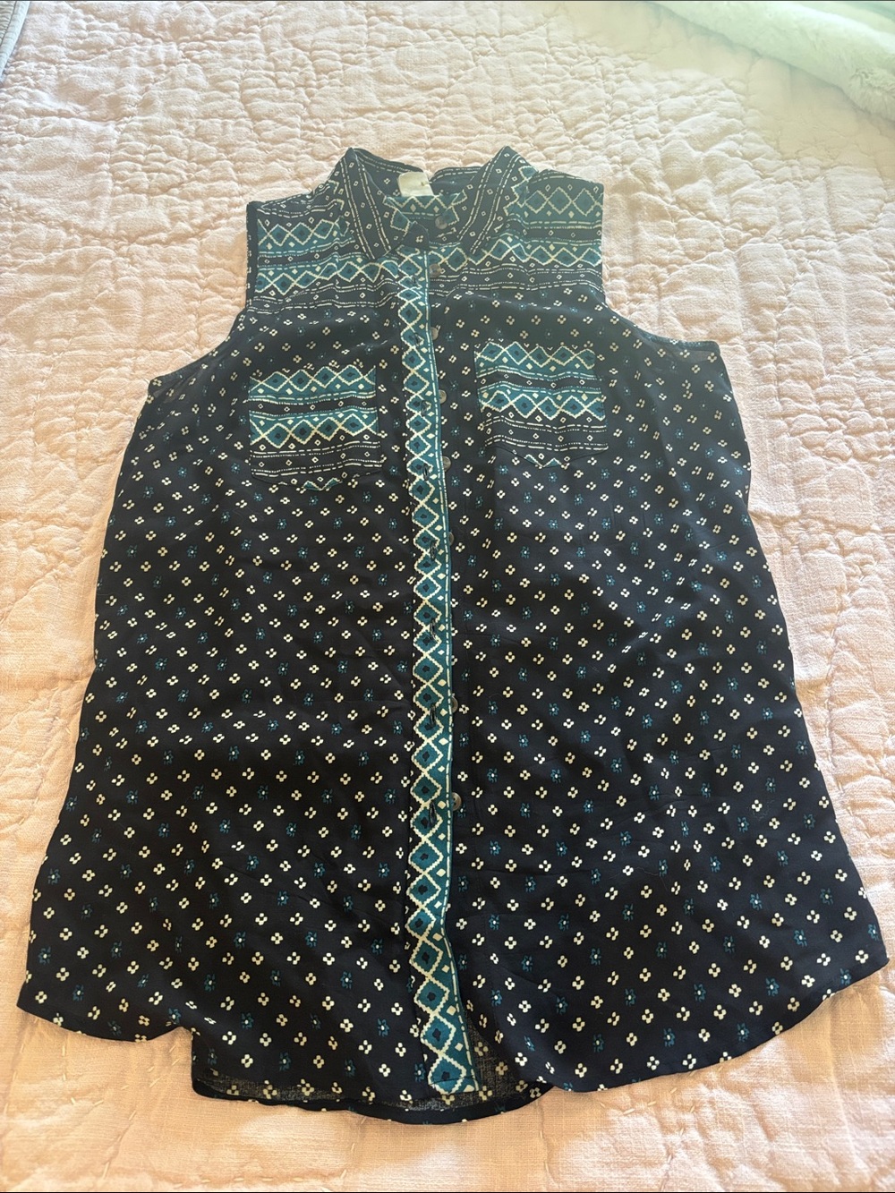 Sleeveless Black Button-Down Shirt with Teal Detail